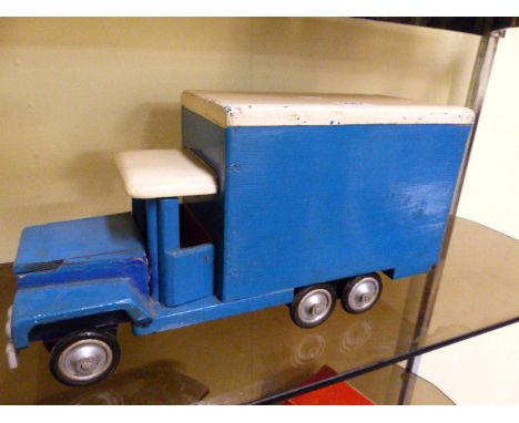 A VINTAGE SCRATCH BUILT WOODEN TOY TRUCK AND A SIMILAR CRANE.  (2)