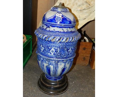 A GERMAN POTTERY VESSEL MOUNTED AS A LAMP. H.60cms.