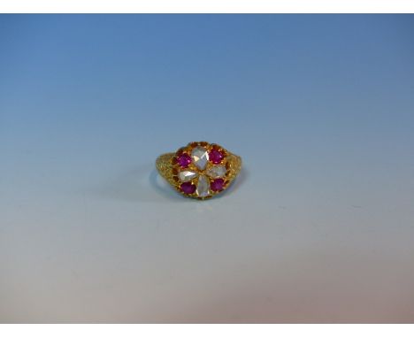 A VICTORIAN 18ct HALLMARKED DIAMOND AND RUBY ORNATE CLUSTER RING WITH CARVED AND ENGRAVED SHOULDERS. FINGER SIZE R, WEIGHT 6.