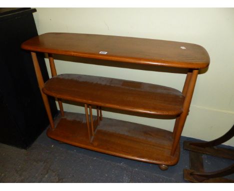 AN ERCOL PALE ELM THREE TIER STAND ON CASTORS.   W.91 x H.71cms.
