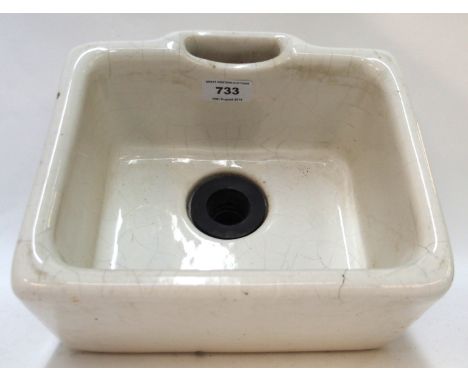 A vintage small ceramic Belfast style sink, purportedly from a train, 24 x 21cm Condition Report: Available upon request