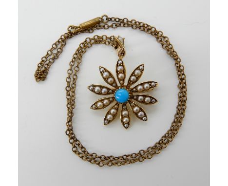 A bright yellow metal Edwardian turquoise and pearl flower pendant, diameter 2.5cm, with gold plated chain weight of the pend