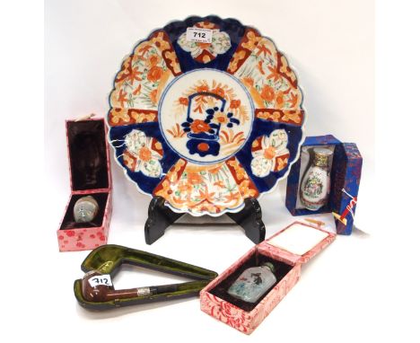 A Japanese imari charger, 30cm diameter, two Chinese inside painted snuff bottles, in boxes, a small vase and a silver mounte