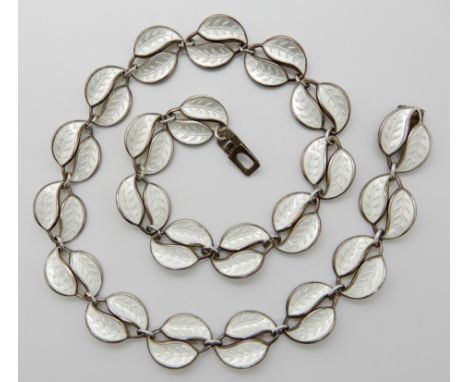 A gilded silver white enamel David Andersen leaf necklace 40cm, weight 28.8cm Condition Report: losses to the gilding, enamel