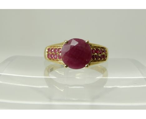 A 9ct gold ruby cluster ring, size P1/2, weight 3.5gms Condition Report: Available upon request