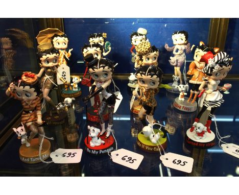 A set of twelve Danbury Mint Betty Boop figures from the Wild Side series including On the Prowl, Feeling Foxy, Ruffle my Fea