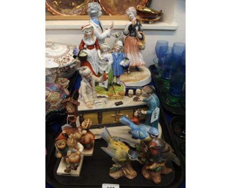 A Yardley's Lavender figure group, 31cm high, two Italian figure groups of Pharmacy scenes, two Hummel figures (slight def) a