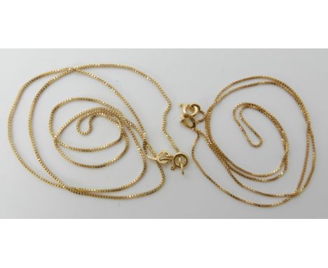 An 18ct gold box chain, length 49cm, together with a finer example length 40cm, combined weight 5.1gms Condition Report: Both