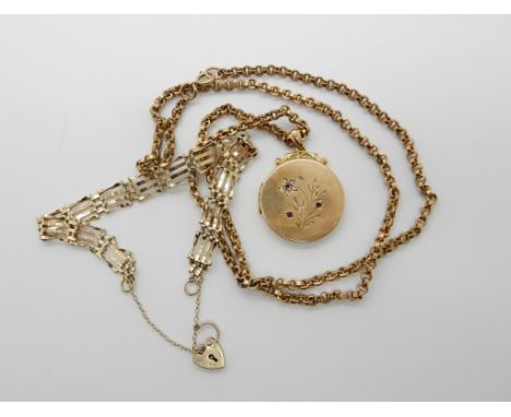 A 9ct back and front locket diameter 2.8cm, with a vintage yellow metal chain length 64cm, together with a 9ct gold gate brac