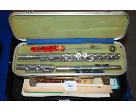 A cased white-metal Regent flute, Dolmetsch Tenor and Dolmetsch Treble recorder, sheet music etc Condition Report: Available 