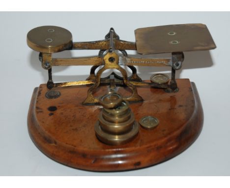 A set of brass vintage postal scales with associated weights, cased fish cutlery and EPNS basket Condition Report: Available 