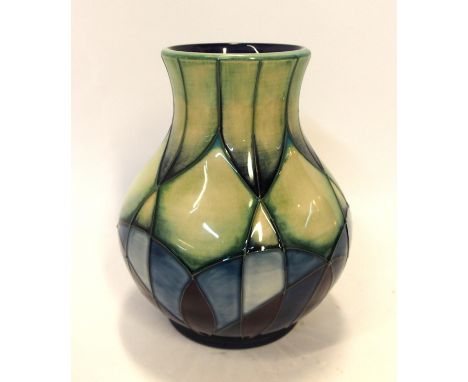 A Moorcroft pottery 'Indigo' pattern vase, 16cm high, designed by Emma Bossons, circa 1999 Condition Report: Available upon r