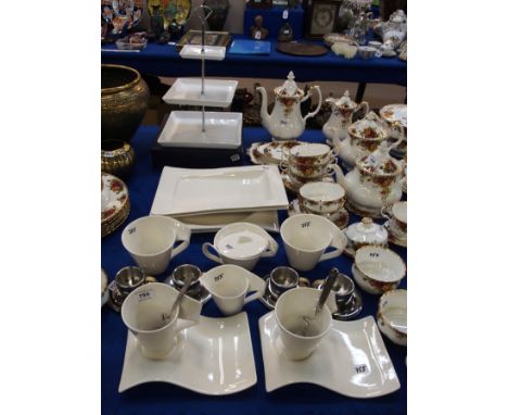 Two Villeroy &amp; Boch New Wave coffee mugs, saucers and spoons, two cafe au lait mugs, milk jug, sugar bowl, two gourmet pl