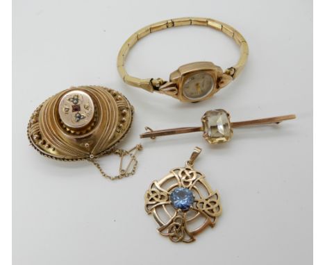 A Victorian yellow metal balloon  brooch, a 9ct blue gem set Celtic cross pendant, a 9ct gem set bar brooch and a ladies 9ct 