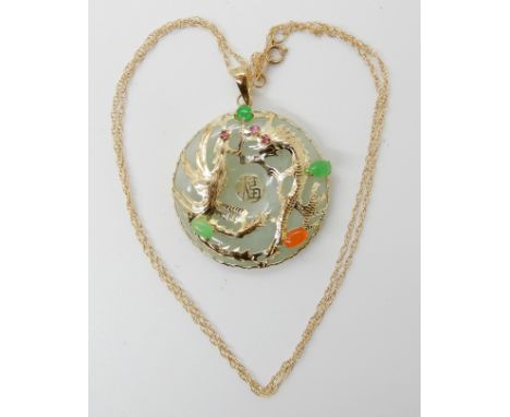 A 14k gold mounted QVC jewellery channel jade and gemstone set phoenix and dragon pendant diameter approx 3.1cm with a 14k go