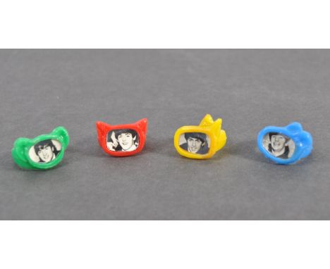 The Beatles - a rare full set of original 1960's The Beatles ' gumball ' type plastic finger rings. Each of a differing colou