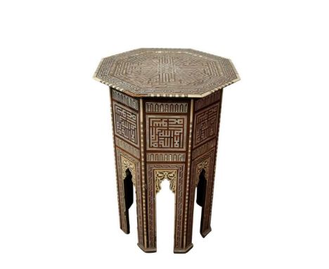 19th century Syrian bone and mother of pearl inlaid table, octagonal form with concentric inlaid dished top raised on mihrab 