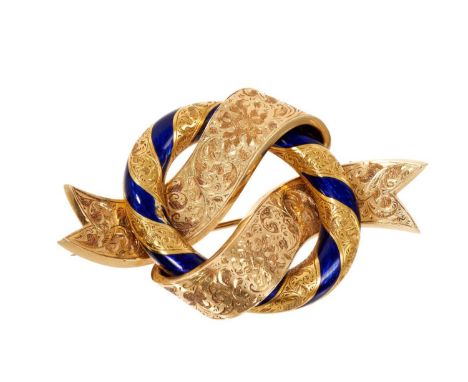 A large Victorian gold and blue enamel garter brooch with blue enamel ribbon and finely engraved floral decoration and a glaz