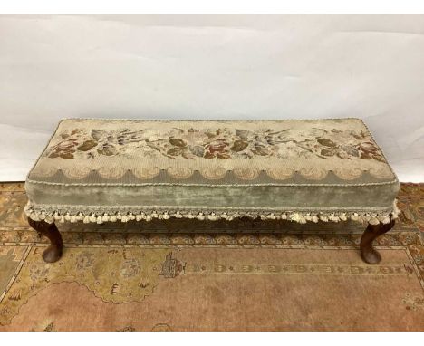 Early 20th century fender stool with foliate tapestry top raised on shell carved walnut cabriole legs, 98cm long