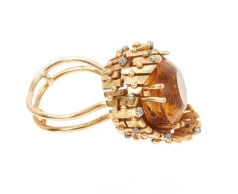 1970s 18ct gold citrine and diamond cocktail ring, possibly by Peter Minturn, New Zealand, with a large round mixed cut citri