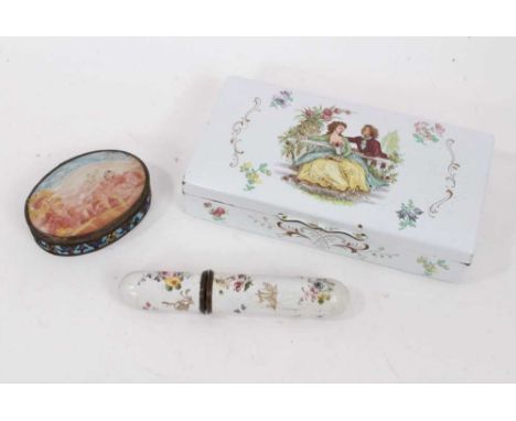 An 18th century South Staffordshire enamel bodkin case, of cylindrical form decorated with floral sprays, 12cm long, together