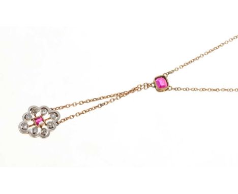 Edwardian diamond and ruby pendant necklace, the openwork plaque with a central step cut ruby and eight old cut diamonds in p