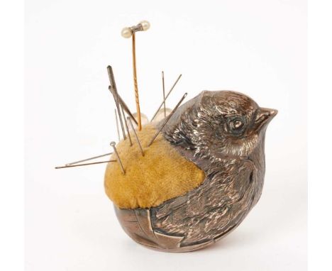 Large Edwardian silver pin cushion, modelled in the form of a chick, stamped Rd 475678 (Chester 1909) Sampson Mordan, togethe