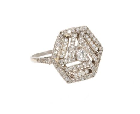 Art Deco diamond and seed pearl ring with a hexagonal openwork plaque centred with an old cut diamond with geometric rows of 