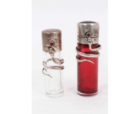 A late Victorian novelty silver snake scent bottle, cylindrical form with cabochon garnet thumbpiece and guilloché enamel ter