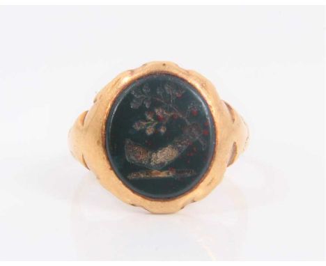 Victorian gold signet ring with a intaglio hardstone bezel, shank split/cut. Approximately size Q.Shank is cut. Not hallmarke