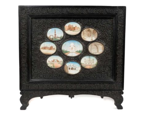 Fine set of nine 19th century Indian miniature architectural paintings on ivory, the oval glazed reserves depicting sites of 
