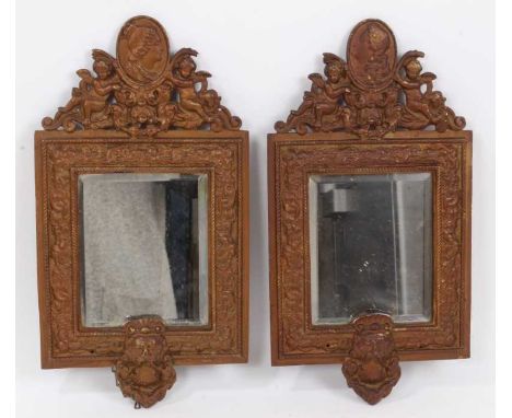 Pair of late 19th / early 20th century French wall mirrors, each with bevelled rectangular plate and portrait medallion to th