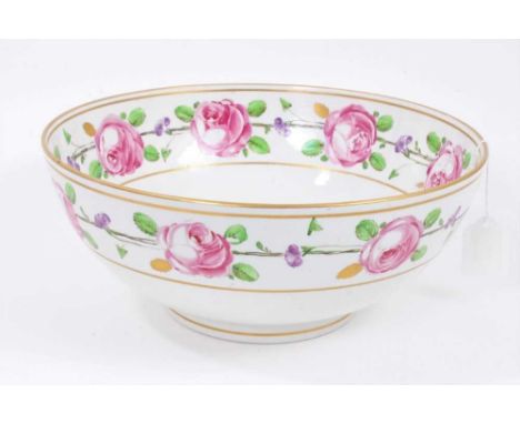 A large French porcelain bowl, painted with roses, circa 1800, mark to base, 30cm diameterSome scratching and some light hair