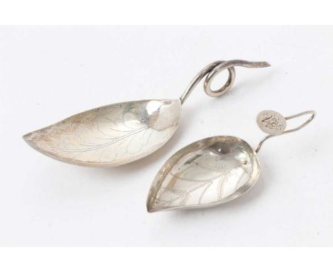 George III silver leaf-shaped bowl caddy spoon with bright cut decoration and wire loop handle , marks incomplete, maker Cock