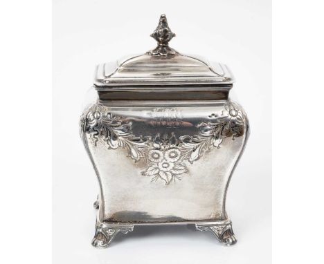 Victorian silver tea caddy of bombe form with chased floral and foliate decoration, raised on four bracket feet, (London 1895