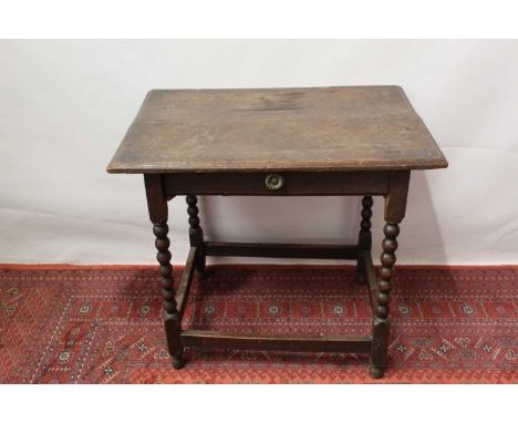 Early 18th century oak side table, with single drawer on bobbin turned legs and stretchers, 80cm wide x 55cm deep x 72cm high