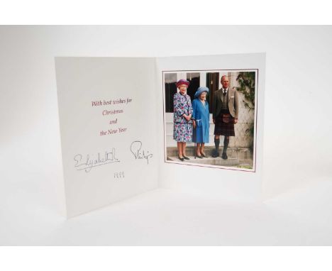 H.M.Queen Elizabeth II and H.R.H.The Duke of Edinburgh signed 1999 Christmas card with twin gilt ciphers to cover, colour pho