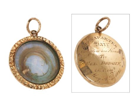 Emperor Napoleon I of France, an important lock of Napoleon's hair in circular gold locket, the roundel of hair on glass grou