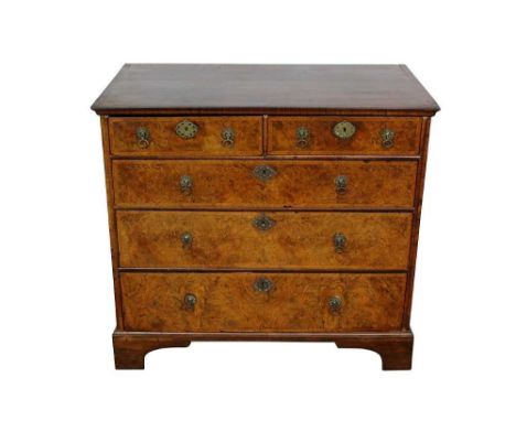 Good early 18th century burr walnut and feather banded chest, with two short over three long graduated drawers on bracket fee