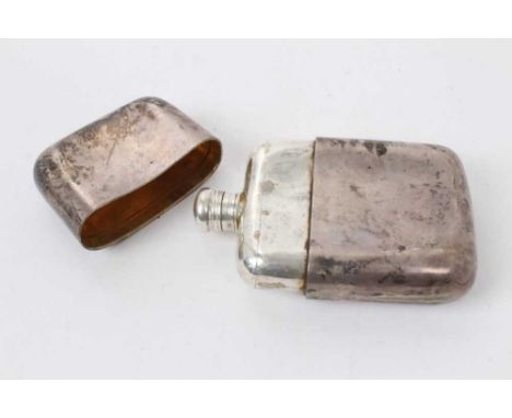 Victorian silver spirit flask of conventional form, with screw cap and separate, top mounted, silver drinking cup cover (Lond