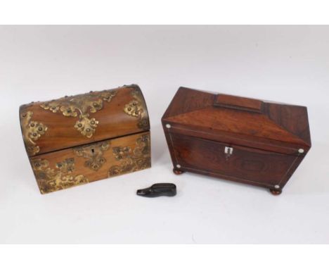 A Victorian walnut stationery box, the domed hinged cover with brass strapwork ornament, enclosing a divided interior, 24cm w