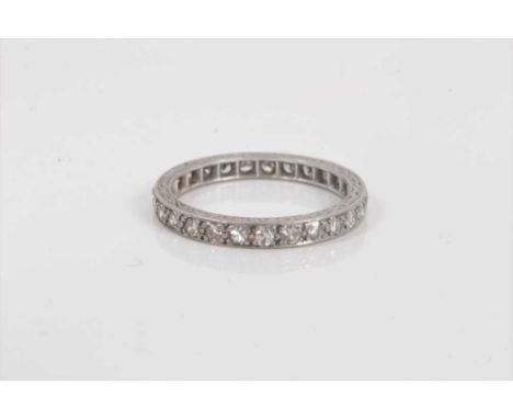 Diamond eternity ring with a full band of single cut diamonds in white gold setting, ring size N.The ring is in good conditio