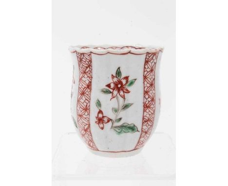 A rare Chaffer's Liverpool coffee cup, circa 1756-58, of fluted baluster form, polychrome painted with flowers bordered by ve