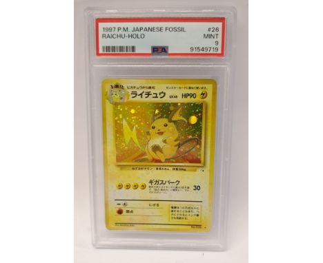 PSA, a Graded 9 1997 Pok&eacute;mon TCG Japanese Fossil Raichu #26. See Photo