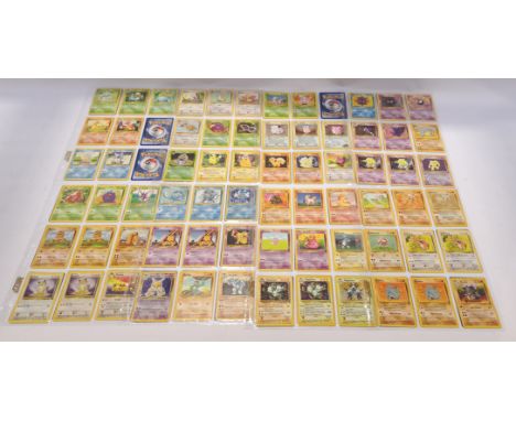 Wizards of the Coast, a Mixed Group of 1999 Pok&eacute;mon Trading Cards. Includes Base Set, Jungle, Fossil, Team Rocket with