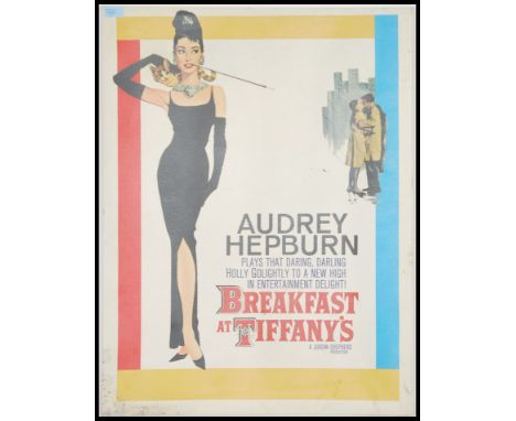 A colourful stretched canvas print of the film Poster ' Breakfast At Tiffany's ' starring Audrey Hepburn. Measures 79 height 