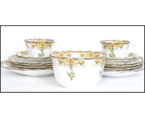 A stunning 19th century Art Nouveau bone China part tea service having hand painted finish over transfer printed design. Stam