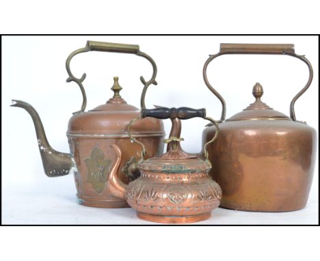 A 19th century Victorian large copper kettle by Edward Wilkes together with a smaller decorative copper teapot and another