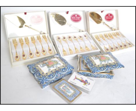 Three boxed sets of Royal Albert Country roses dessert forks together with a pair of lidded Wedgwood table top card cases eac