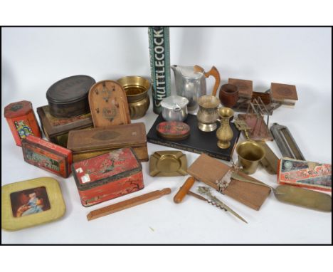 A mixed lot to include vintage advertising tins, brass and copper wares, etc. Please see images.